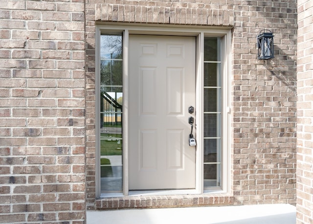 1685 E Wattles Rd, Troy, MI 48085 - entrance to property featuring brick siding