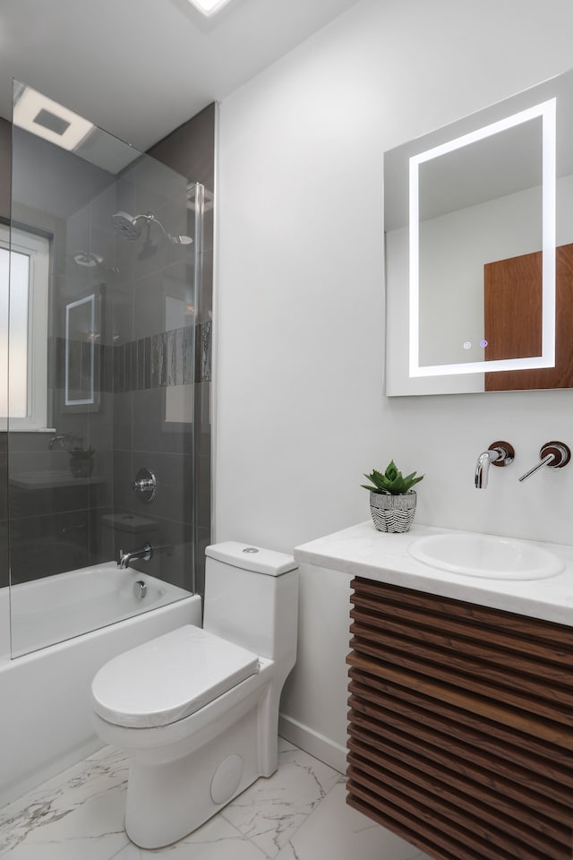 bathroom with vanity, combined bath / shower with glass door, toilet, and marble finish floor