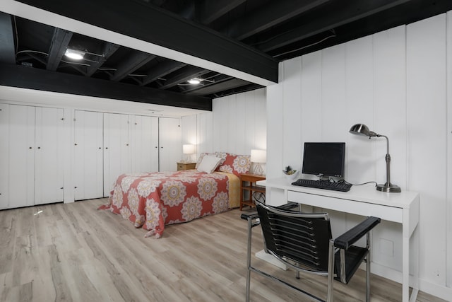 bedroom with light wood-style floors