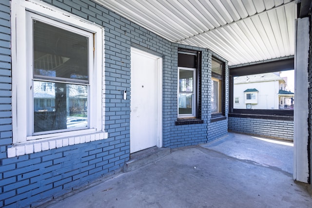 574 Melbourne St, Detroit, MI 48202 - view of exterior entry featuring brick siding