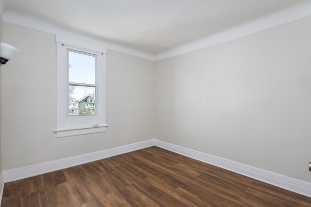 574 Melbourne St, Detroit, MI 48202 - unfurnished room with dark wood-style flooring and baseboards