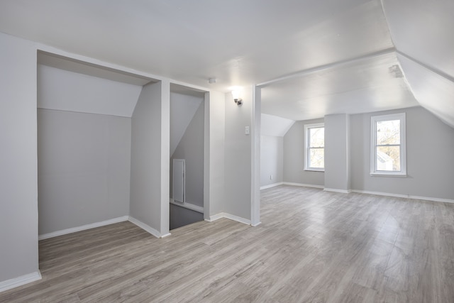 574 Melbourne St, Detroit, MI 48202 - additional living space featuring baseboards, light wood-style flooring, and lofted ceiling
