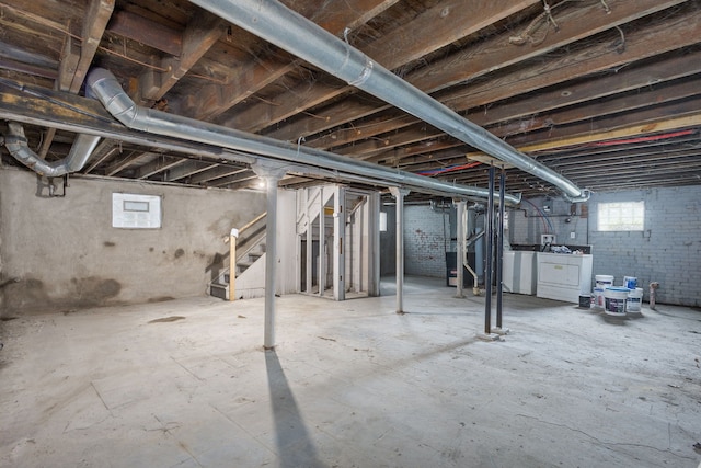 574 Melbourne St, Detroit, MI 48202 - basement featuring washing machine and clothes dryer and stairway