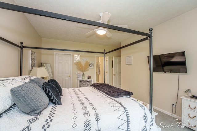 carpeted bedroom with baseboards and a ceiling fan