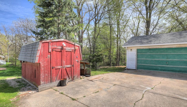 325 Pearl St, South Haven, MI 49090 - detached garage with a storage shed