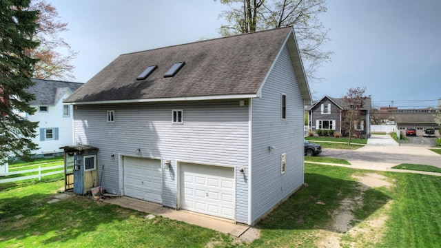 325 Pearl St, South Haven, MI 49090 - view of side of property with roof with shingles and a yard
