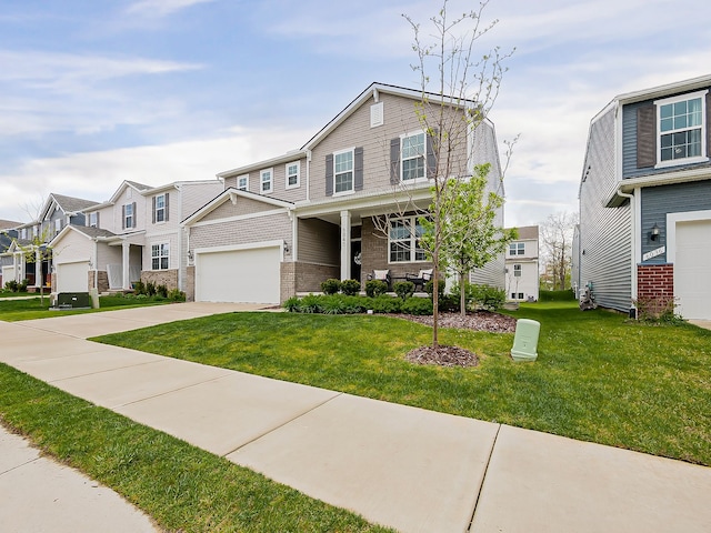 view of front facade with a residential view, a garage, concrete driveway, a front yard, and brick siding