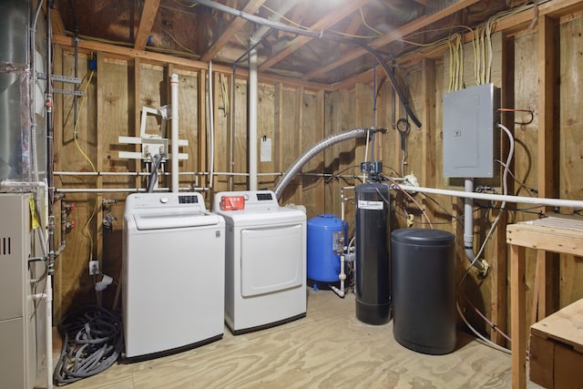 15756 Lewis Rd, Mussey, MI 48014 - unfinished basement featuring electric panel, washer and clothes dryer, a water pressure tank, and a water softener