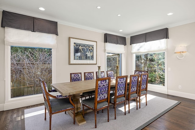 dining area featuring crown molding, recessed lighting, baseboards, and dark wood-style floors