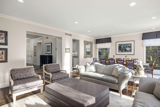 living room featuring recessed lighting, wood finished floors, and visible vents