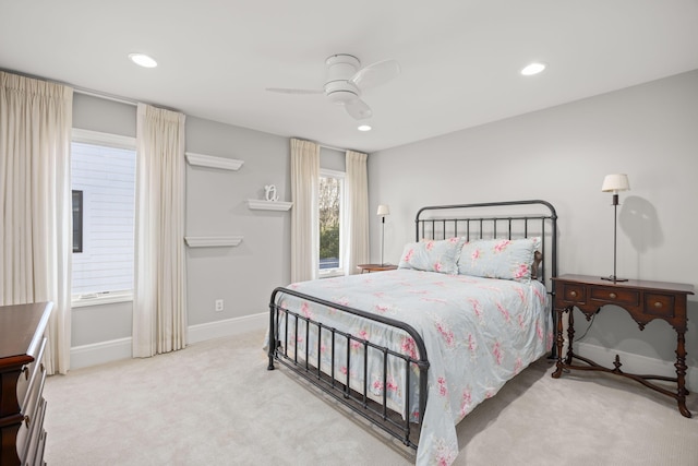 carpeted bedroom featuring recessed lighting, a ceiling fan, and baseboards