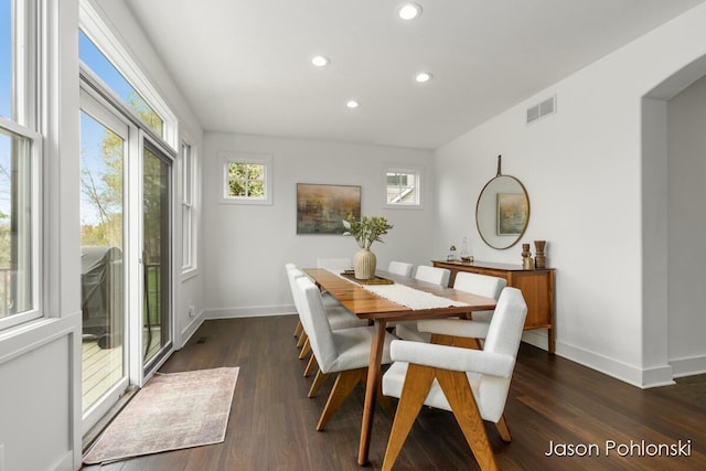 dining space with a healthy amount of sunlight, baseboards, recessed lighting, and visible vents