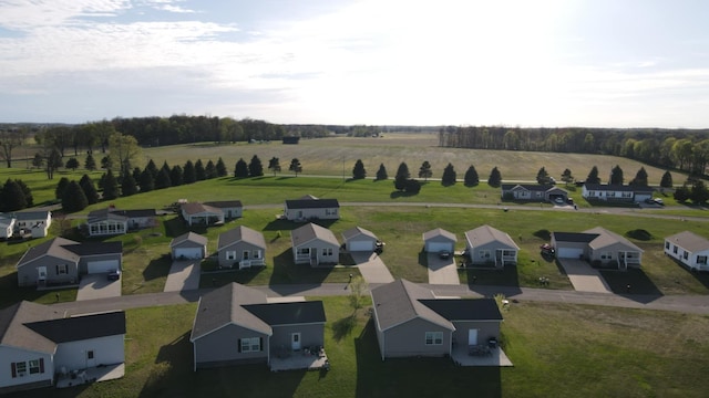 drone / aerial view with a residential view and a rural view