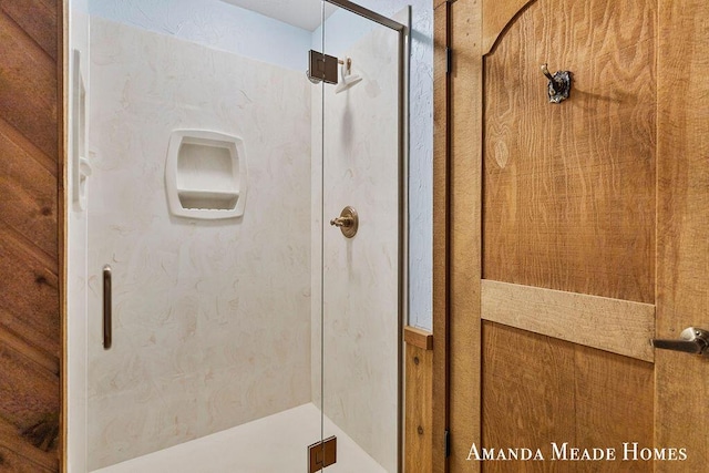 bathroom featuring a stall shower