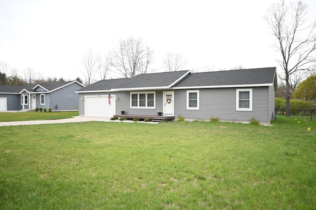 ranch-style house with a shingled roof, an attached garage, concrete driveway, and a front yard