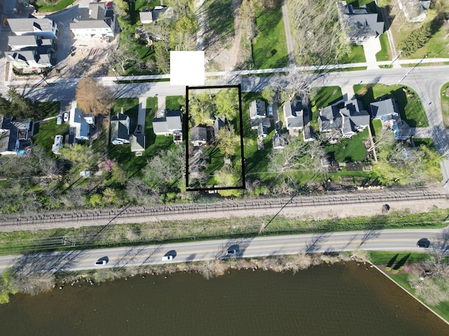 aerial view featuring a water view and a residential view