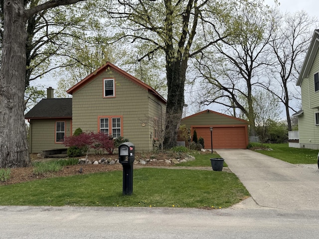 view of front of property featuring an outdoor structure, a garage, a front lawn, and a chimney