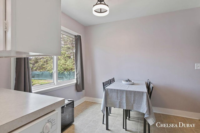 dining room with baseboards