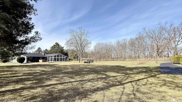 7736 S Custer Rd, Monroe, MI 48161 - view of yard featuring a sunroom