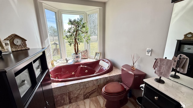 7736 S Custer Rd, Monroe, MI 48161 - bathroom with toilet, a tub with jets, and marble finish floor