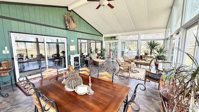 7736 S Custer Rd, Monroe, MI 48161 - sunroom / solarium with french doors, lofted ceiling with beams, a wealth of natural light, and wood walls