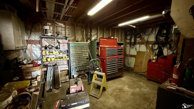 7736 S Custer Rd, Monroe, MI 48161 - interior space with concrete floors and a workshop area