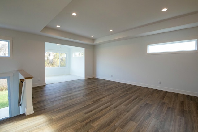interior space featuring recessed lighting, dark wood-style flooring, and a wealth of natural light
