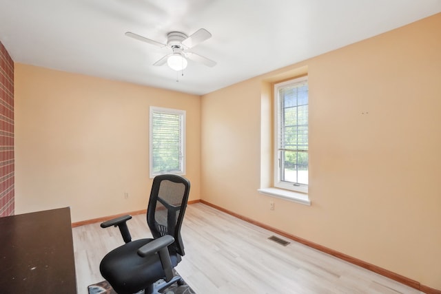 1373 Prosper Dr, Troy, MI 48098 - unfurnished office featuring healthy amount of natural light, light wood-style floors, ceiling fan, and baseboards