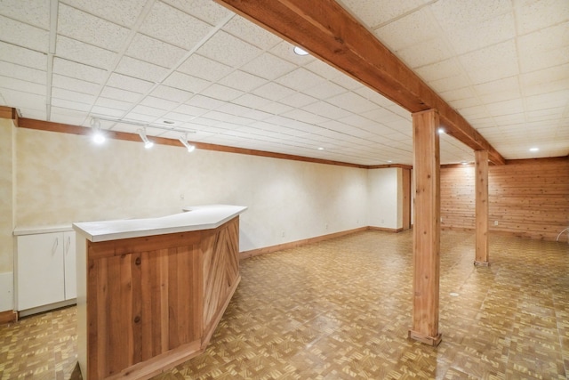 1373 Prosper Dr, Troy, MI 48098 - finished basement with wood walls, a wainscoted wall, a dry bar, a drop ceiling, and track lighting