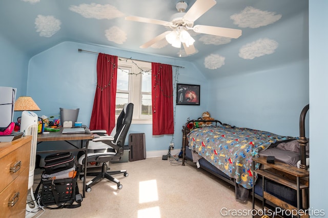 carpeted bedroom featuring a ceiling fan, baseboards, and lofted ceiling
