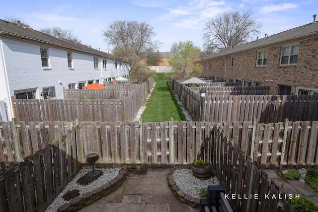 view of patio featuring a fenced backyard