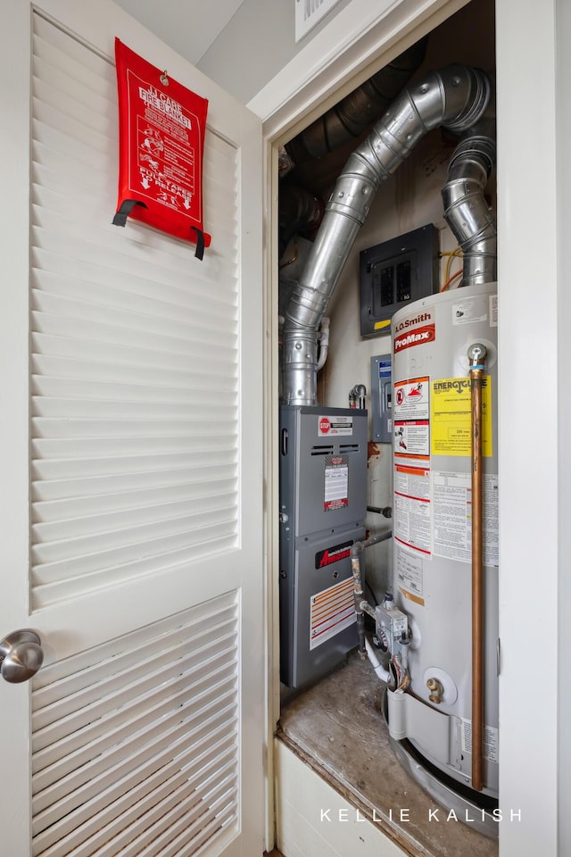 utility room with water heater