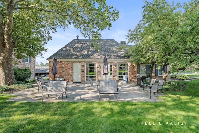 exterior space with a grill
