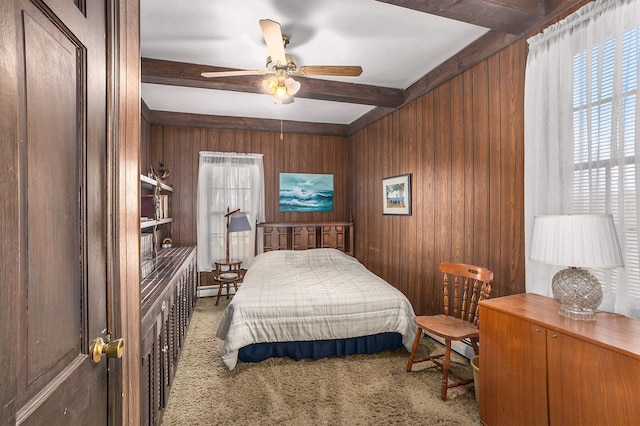 3500 N Oceana Dr, Hart, MI 49420 - carpeted bedroom featuring beam ceiling and wooden walls