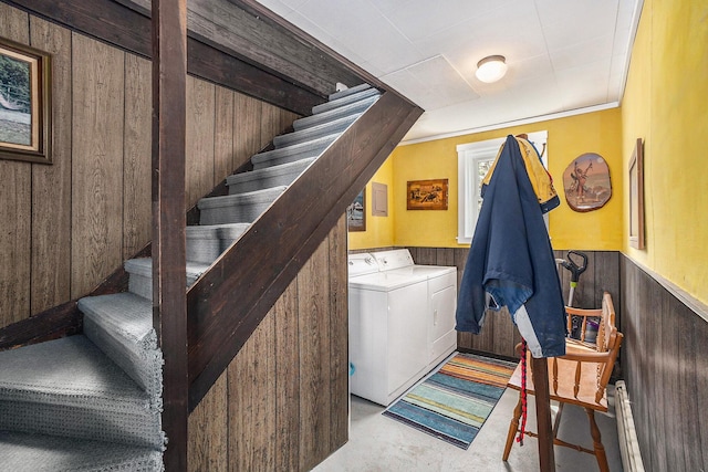 3500 N Oceana Dr, Hart, MI 49420 - laundry area with separate washer and dryer, laundry area, a wainscoted wall, and wood walls