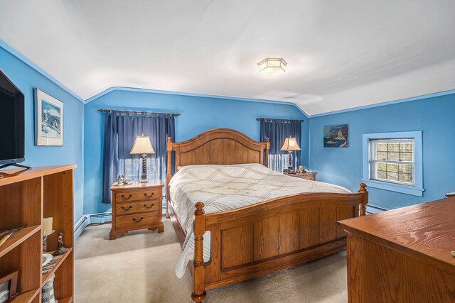 3500 N Oceana Dr, Hart, MI 49420 - carpeted bedroom with lofted ceiling and a baseboard radiator