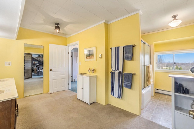 3500 N Oceana Dr, Hart, MI 49420 - bathroom with vanity, ornamental molding, bath / shower combo with glass door, a baseboard heating unit, and carpet