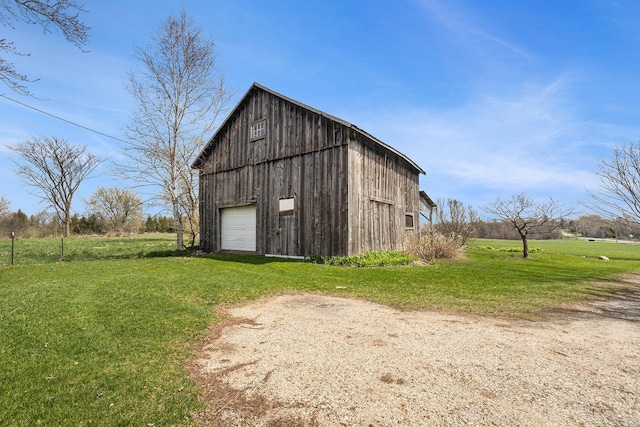3500 N Oceana Dr, Hart, MI 49420 - view of barn with a lawn and driveway