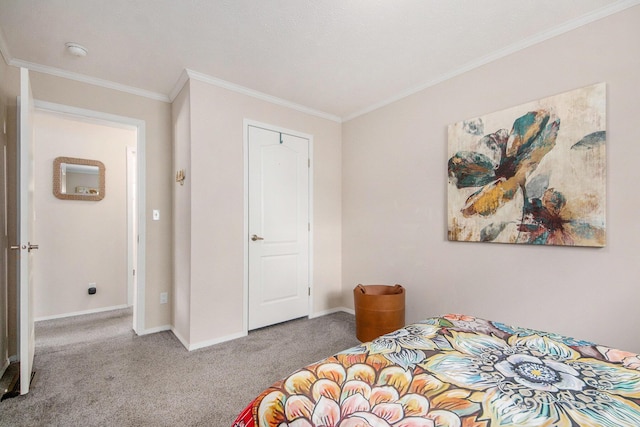 carpeted bedroom featuring baseboards and ornamental molding