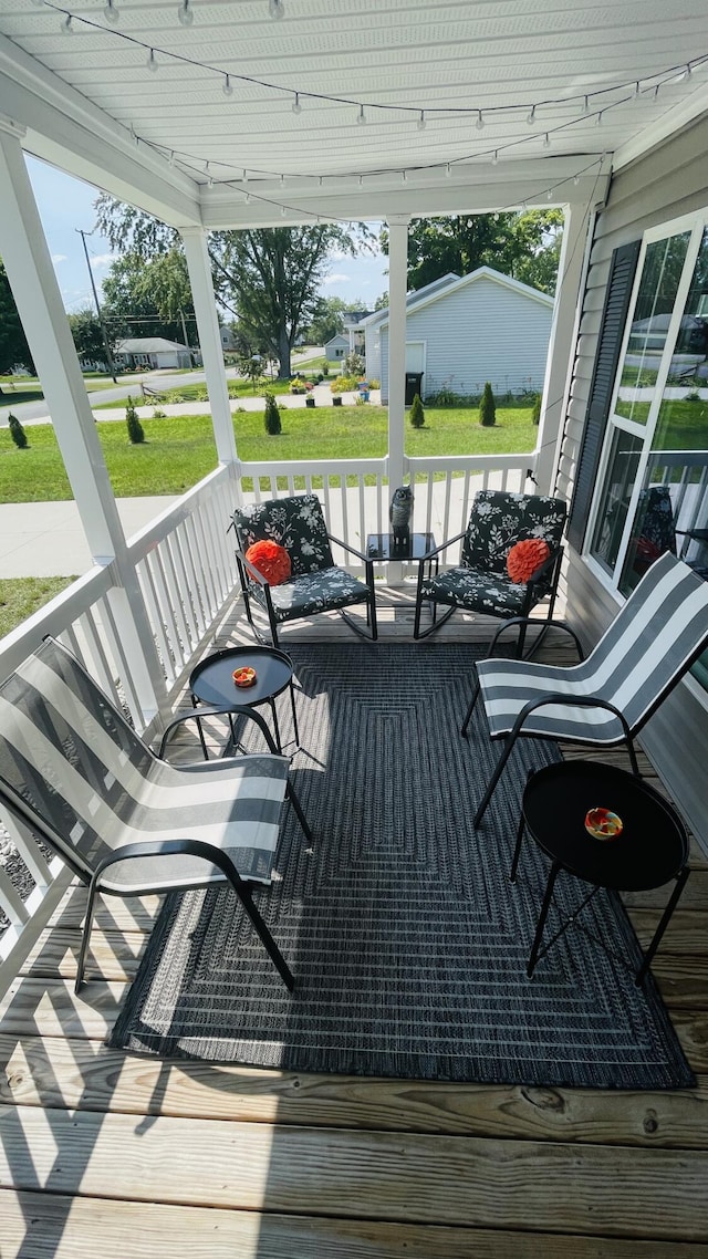wooden deck featuring a porch