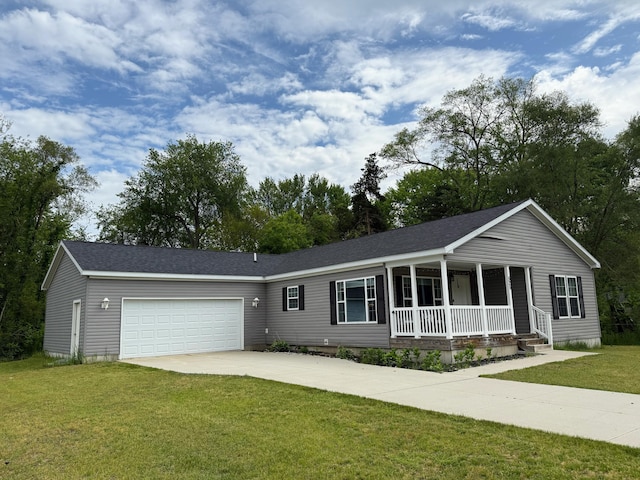 525 66th St SE, Grand Rapids, MI 49548 - ranch-style home with a porch, driveway, a front lawn, and a garage
