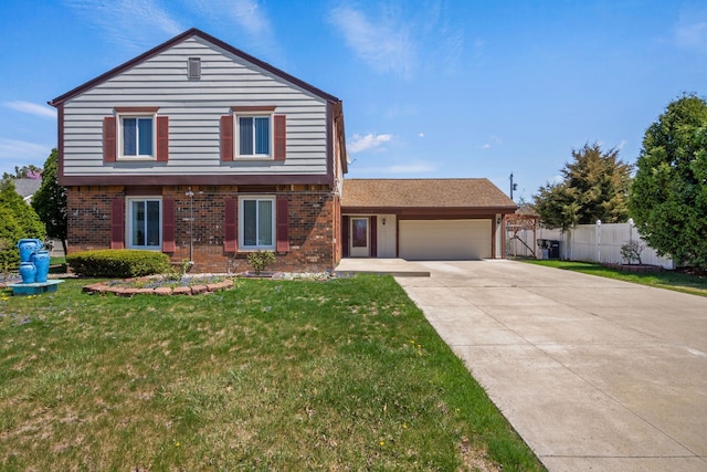 35490 Hatherly Dr, Sterling Heights, MI 48310 - traditional-style house with brick siding, an attached garage, a front yard, and concrete driveway