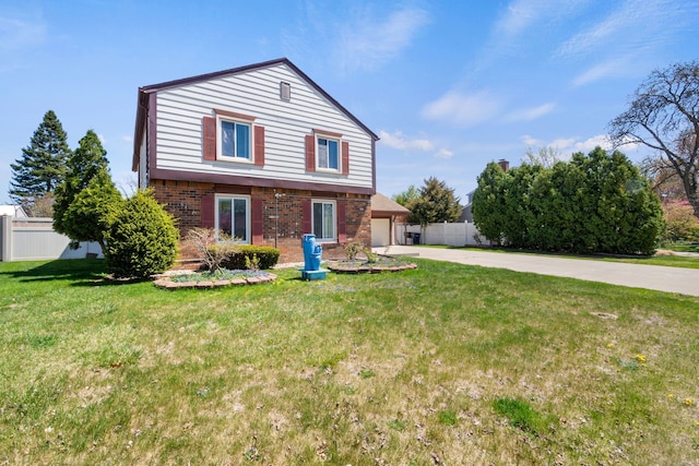 35490 Hatherly Dr, Sterling Heights, MI 48310 - traditional-style home featuring fence, brick siding, a garage, a front yard, and concrete driveway