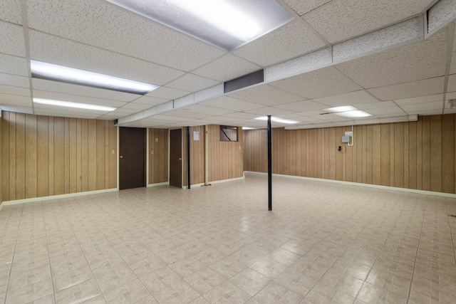 35490 Hatherly Dr, Sterling Heights, MI 48310 - finished basement with wooden walls, baseboards, a drop ceiling, and visible vents