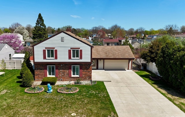 35490 Hatherly Dr, Sterling Heights, MI 48310 - view of front of house with brick siding, an attached garage, driveway, and fence
