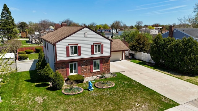 35490 Hatherly Dr, Sterling Heights, MI 48310 - view of front of property featuring fence, a front lawn, brick siding, a garage, and a chimney