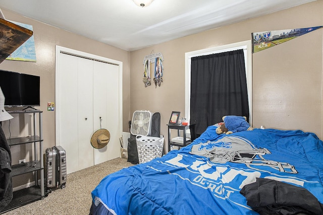carpeted bedroom with a closet