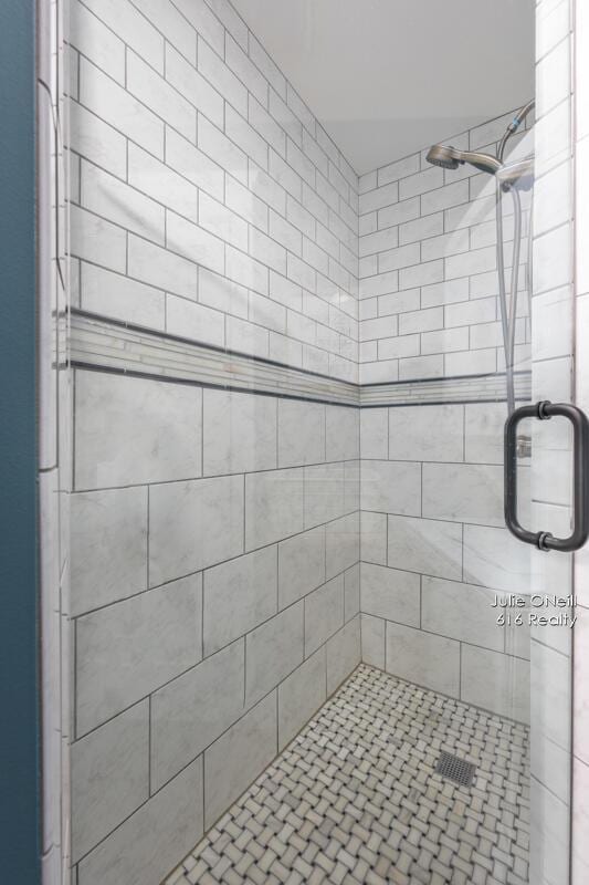 full bathroom with a stall shower
