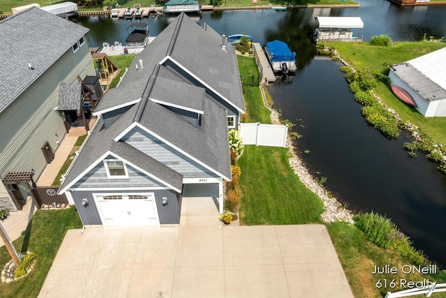 drone / aerial view featuring a water view