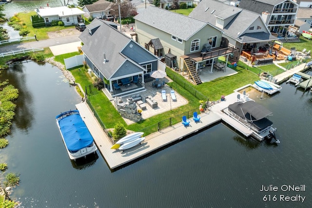 drone / aerial view featuring a water view